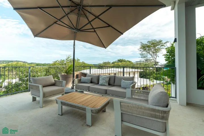 outdoor living area on main pool level terrace