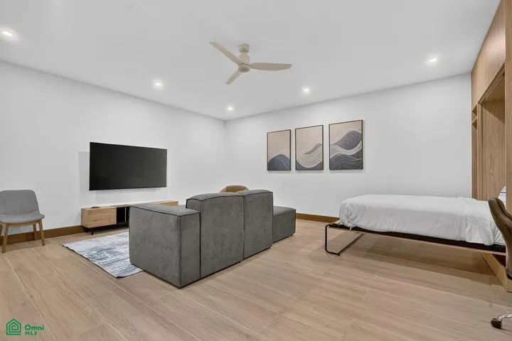 cinema - entertainment room w two murphy beds