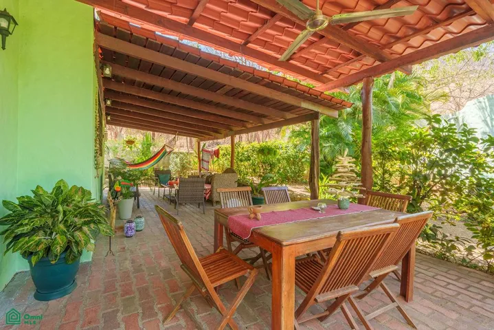 Income-producing villas walking distance to beach