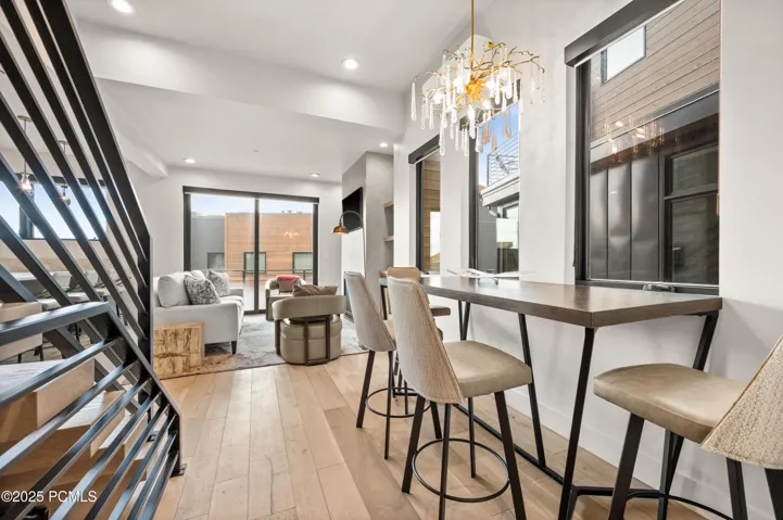 Also included in the great room is this dining area that features a fabulous chandelier.