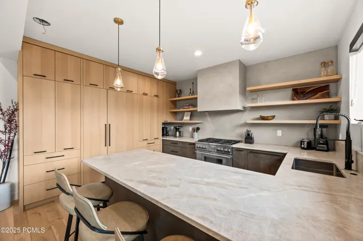 The hidden refrigerator bodes well for the clean lines of this stunning kitchen.