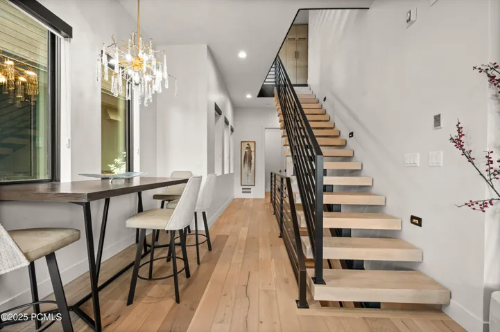 From the great room, this hall leads to the laundry room, a 3/4 bath and a bedroom.