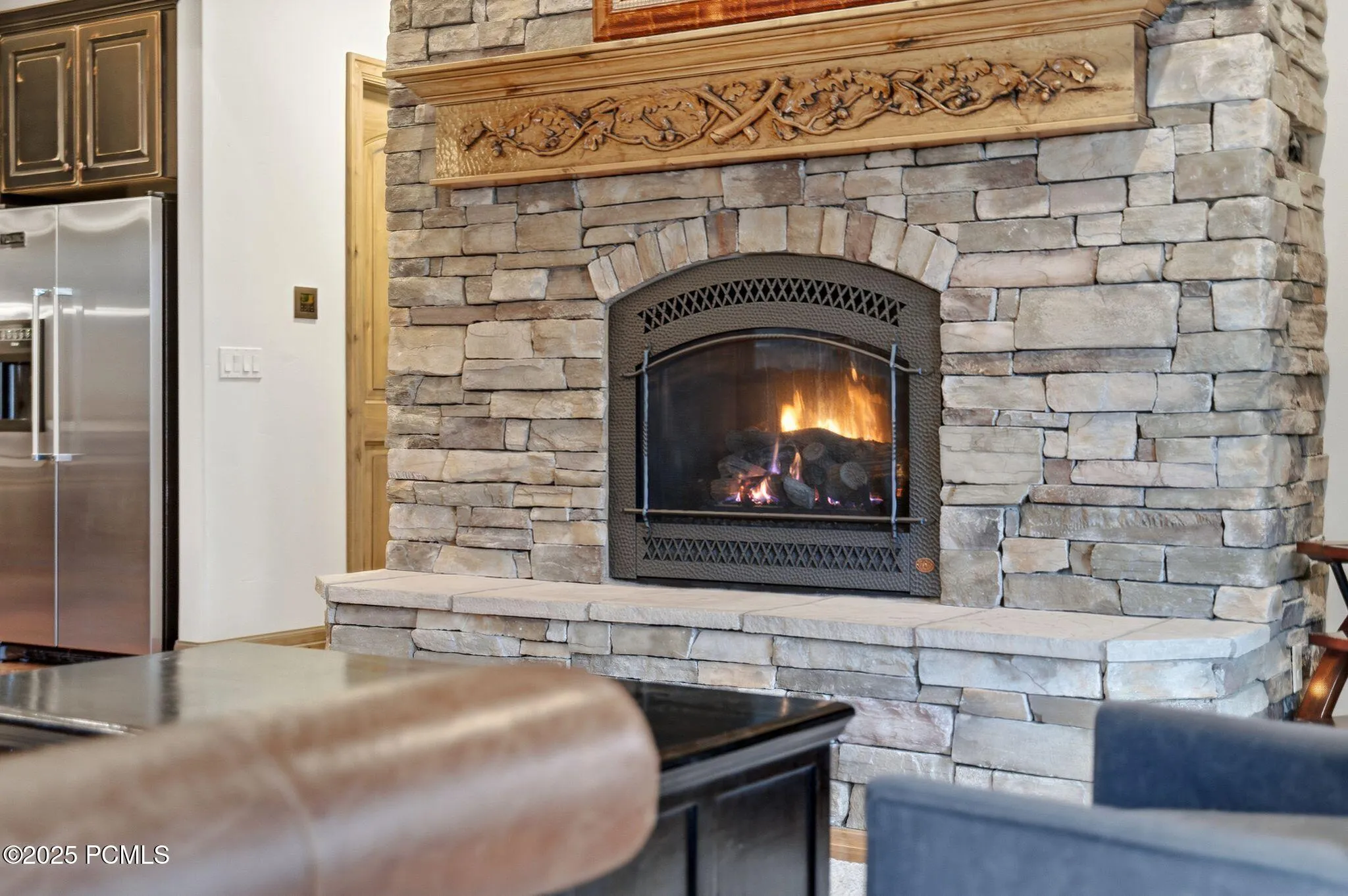Floor to ceiling stone fireplaces