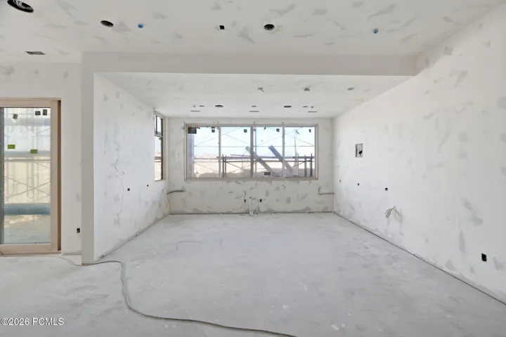 View of wet bar featuring pass thru windows