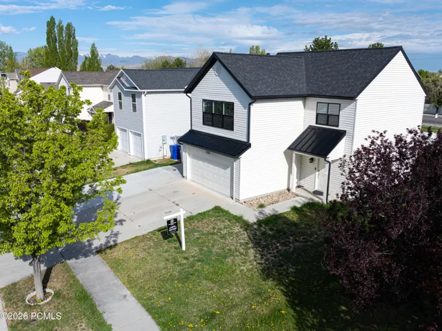 New Siding, Roof & Windows, and Metal Roofing on Eaves. Additional temperature controlled Garage/Shop. Mature Landscaping