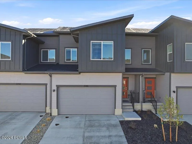 Modern home featuring an attached garage