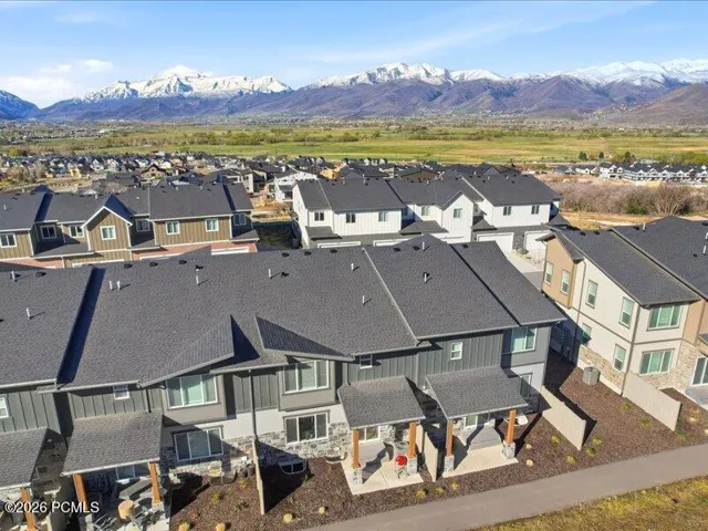 Aerial view of residential area with a mountainous background