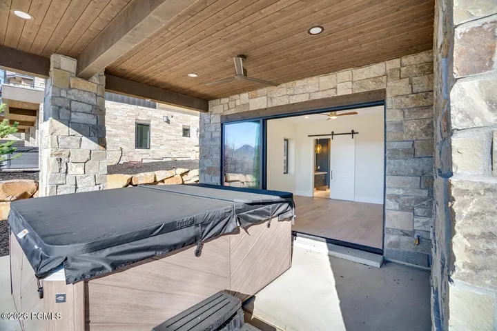 Lower Level Patio off Primary Bedroom with Hot Tub