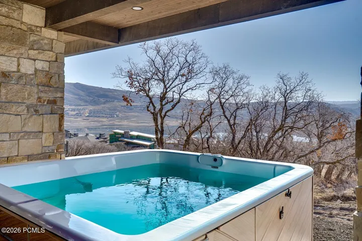 Lower Level Patio off Primary Bedroom with Hot Tub