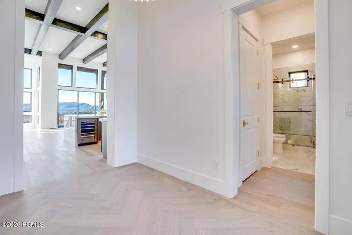 Hallway leading into Kitchen and Living Room