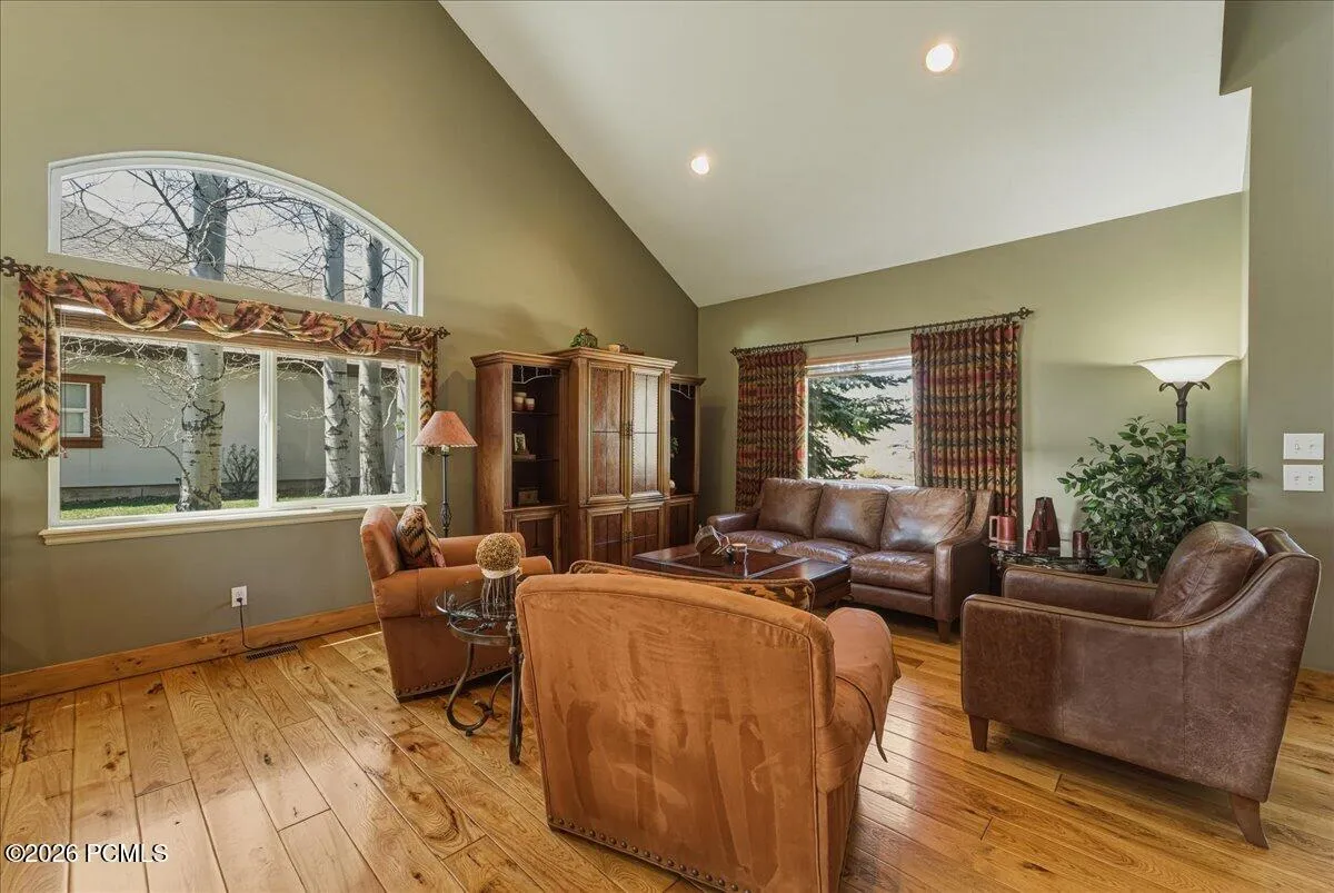 Living Room with Vaulted Ceilings, Hickory Floors and large windows