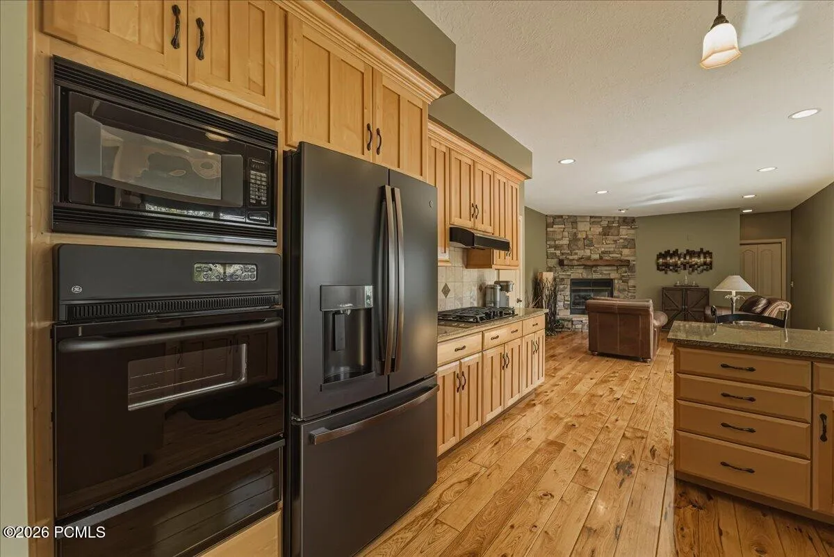 Kitchen with Mountain Views, Gas Stove Top, Wall Oven, Hickory Floors and Pantry.