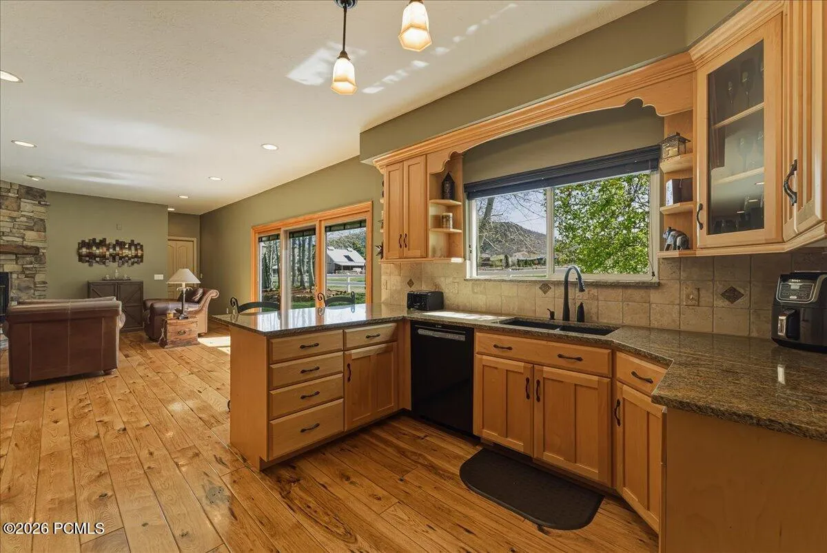 Kitchen with Mountain Views, Gas Stove Top, Wall Oven, Hickory Floors and Pantry.