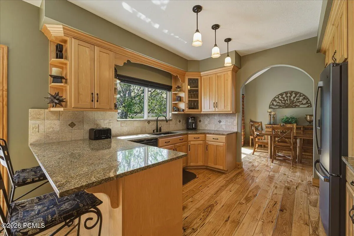 Kitchen with Mountain Views, Gas Stove Top, Wall Oven, Hickory Floors and Pantry.