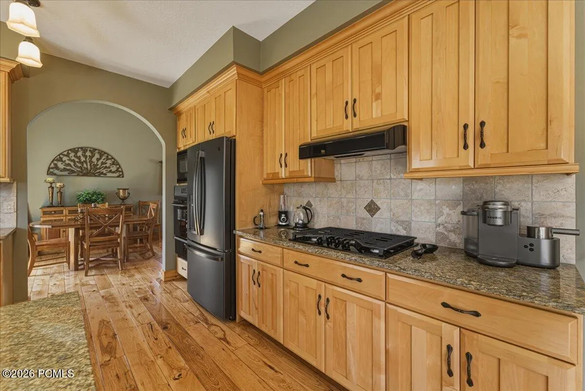 Kitchen with Mountain Views, Gas Stove Top, Wall Oven, Hickory Floors and Pantry.