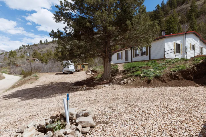 Well on property and view of house