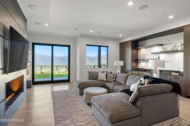 Large TV View Area, Bar and Fireplace