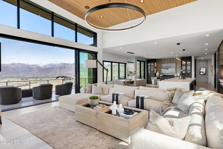Sliding Wall of Glass Opens Up to Massive Deck
