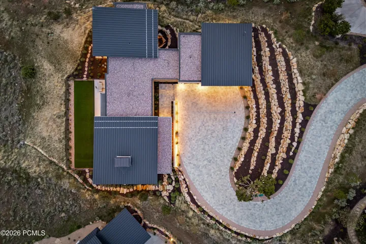Dramatic Driveway Entrance and Stone Landscape Walls