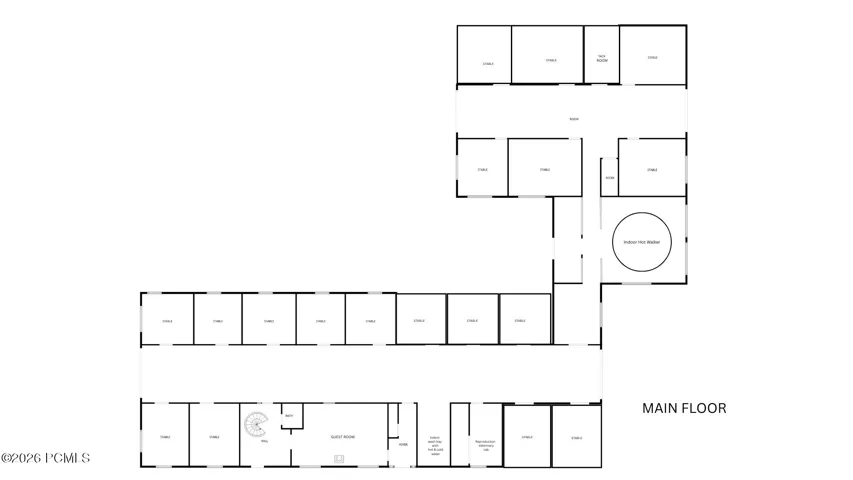 The main floor layout creates a seamless transition between the home’s private living areas—such as the guest room and foyer—and the ranch’s professional facilities, including the reproduction and veterinary lab and adjoining stables. A central spiral staircase connects these spaces to the upper level of the residence and the main living areas, tying the entire structure together with purpose and ease.