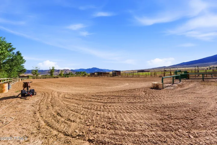 Professionally built arena with proper footing, roping boxes, remotecontrolled Chute Help roping chute, stripping chute, and a livestock return alley. Designed for team roping, barrel work, and general performancehorse training.