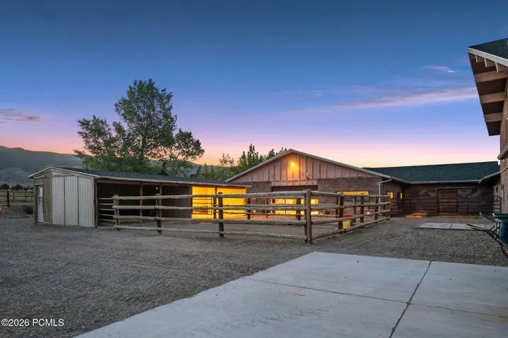 whelping/foaling barn featuring 2 oversized stalls, each with Ritchie heated waterers, full rubber mats, and original whelping boxes complete with heat lamps and power.