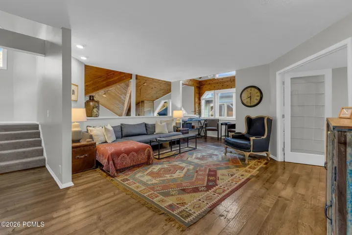 Family Room. Stairs lead up to Primary Suite