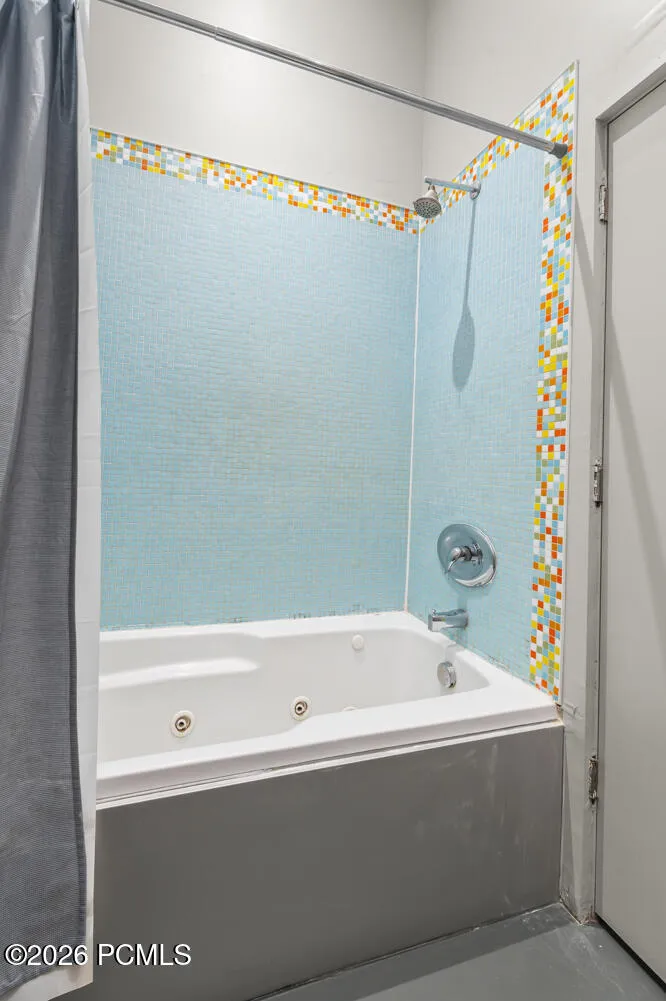 Lower bath shower