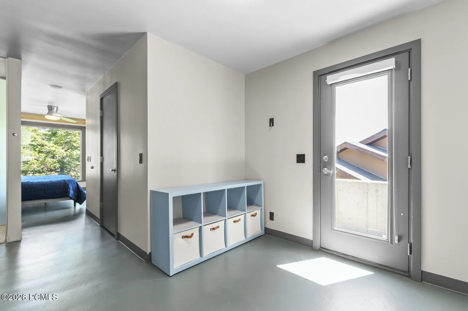 Primary Bedroom Bonus space and 2nd door to patio
