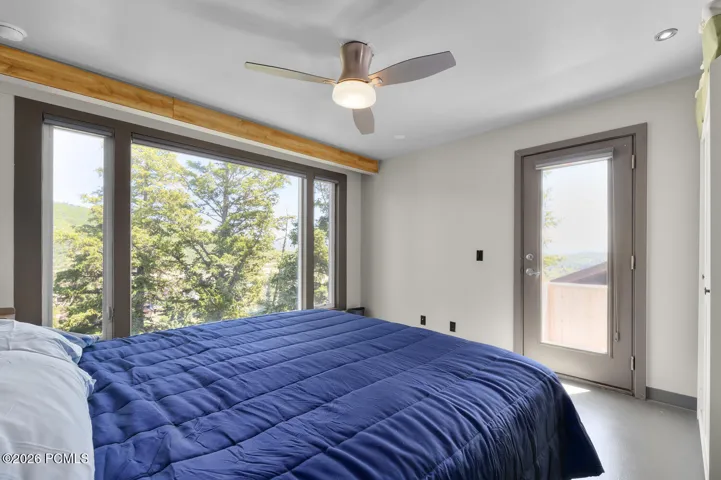 Primary Bedroom with door to patio