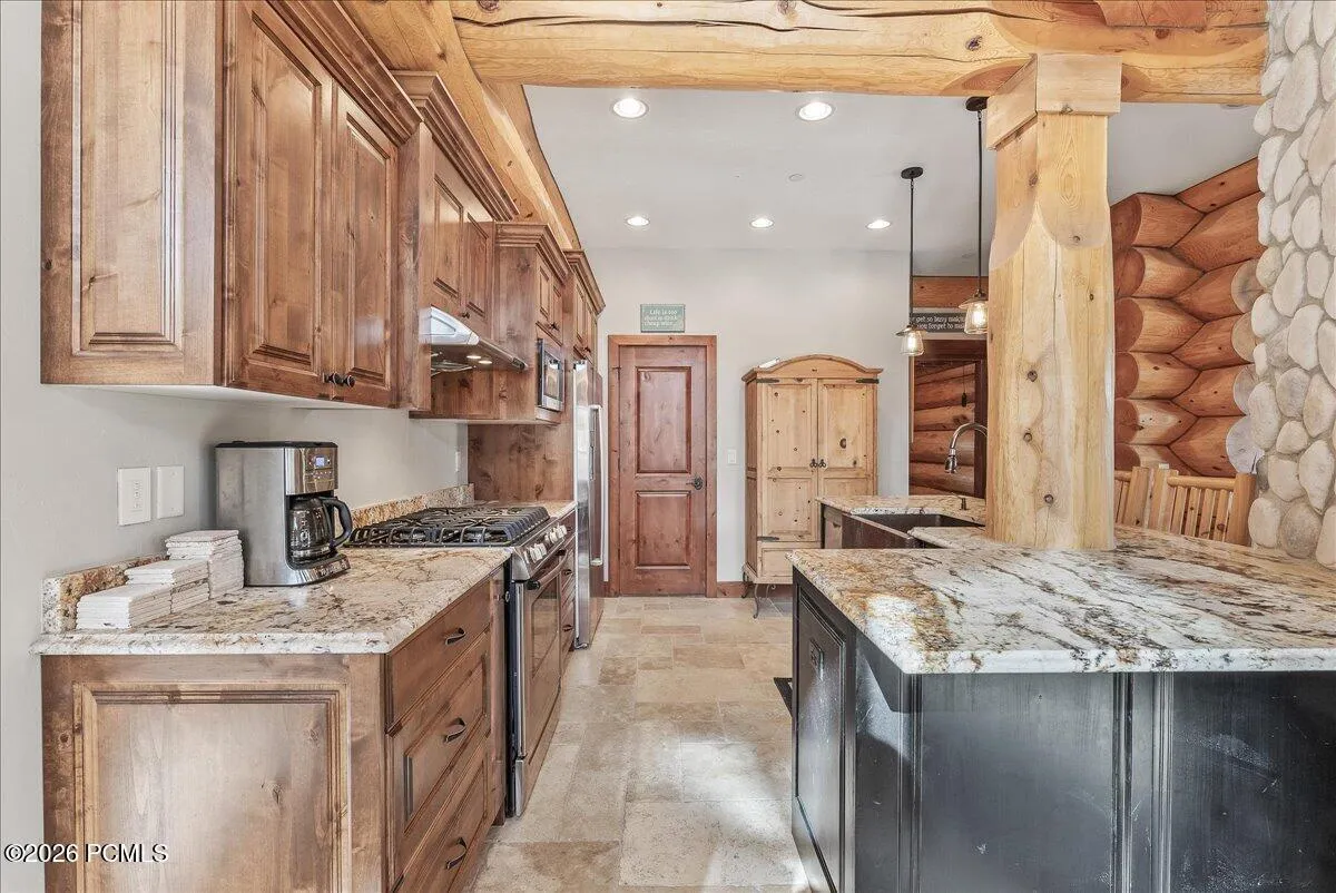 Kitchen with Alder Cabinets, granite counters and pantry