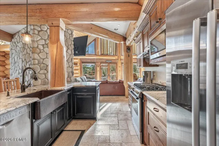 Kitchen area with granite counters