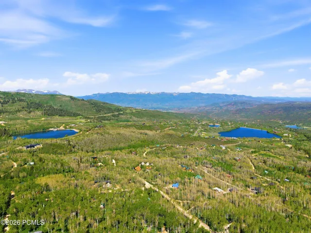 Drone image highlighting the property's proximity to outdoor recreation, mountain trails, and the natural landscape of the Wasatch Back.