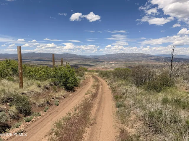 Dirt Road (Center Rd) leading to the property