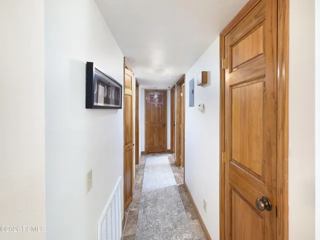 Hall with linen closet a the end