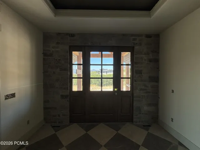 Entrance foyer featuring beautiful stone