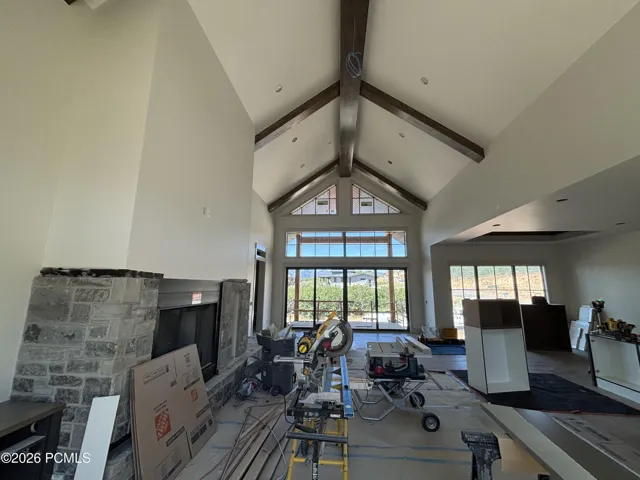 Spacious living space featuring vaulted ceilings