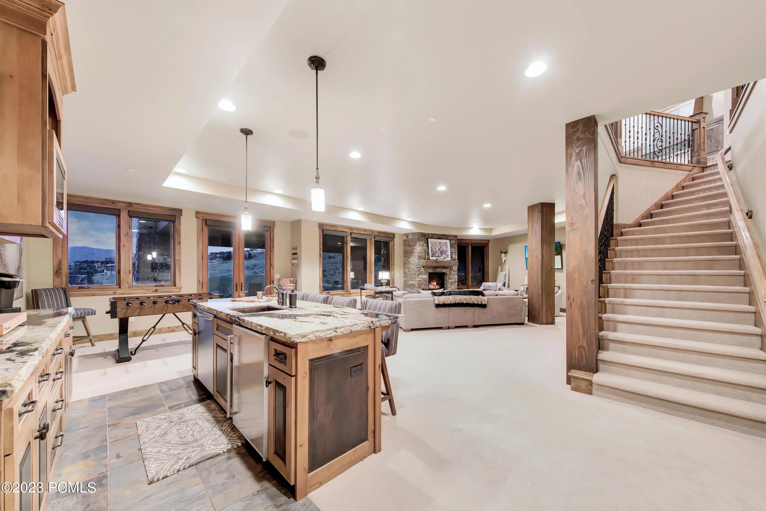 Lower level with doors that walk-out to covered patio