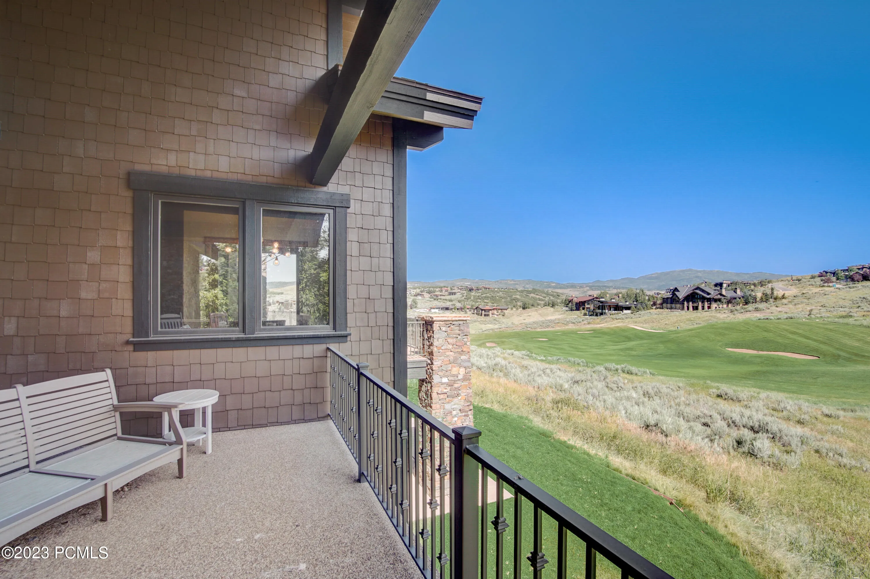 Private Deck and Golf Course Views From Primary Bedroom Main Floor