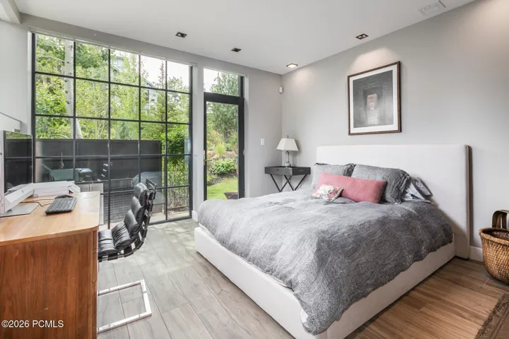 Second Floor Bedroom with glass wall.