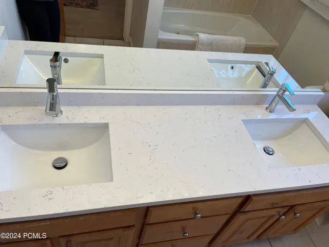 New quartz counters, sink & faucets.