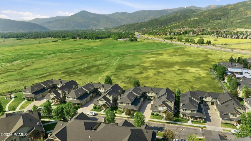 Aerial drone panorama of Fox Point at Redstone and surrounding Park City landscape — rare sub-$1M Park City townhome opportunity, 30 minutes to SLC airport.