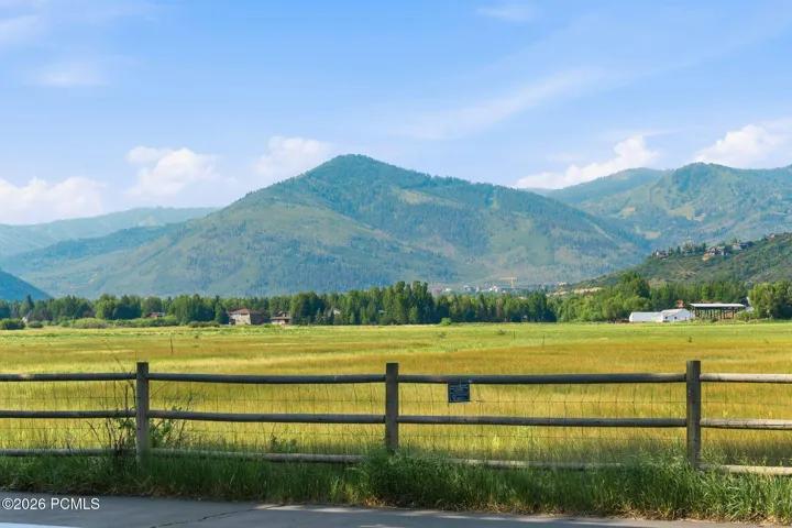 Expansive mountain and valley views surrounding the Fox Point at Redstone community — Park City outdoor lifestyle with trail access steps away.