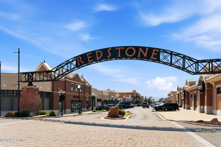 Iconic Redstone community entrance arch — Fox Point at Redstone townhome is walkable to Red Rock Brewery, Sushi Blue, Redstone 8 Cinemas, and the trail behind the community.