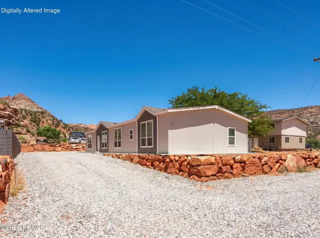 Virtual landscaping shown. Gravel has been digitally added to select photos.