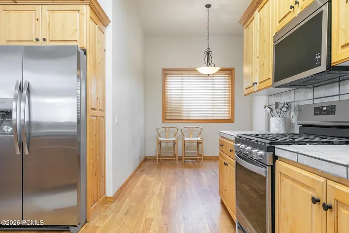 Enjoy the versatility of a charming nook just off the kitchen—an ideal space for a breakfast area, workspace, reading corner, or whatever best fits your lifestyle.