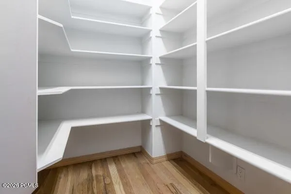 Generously sized pantry offers excellent storage for food, small appliances, and everyday essentials, keeping the kitchen organized and effortlessly functional.