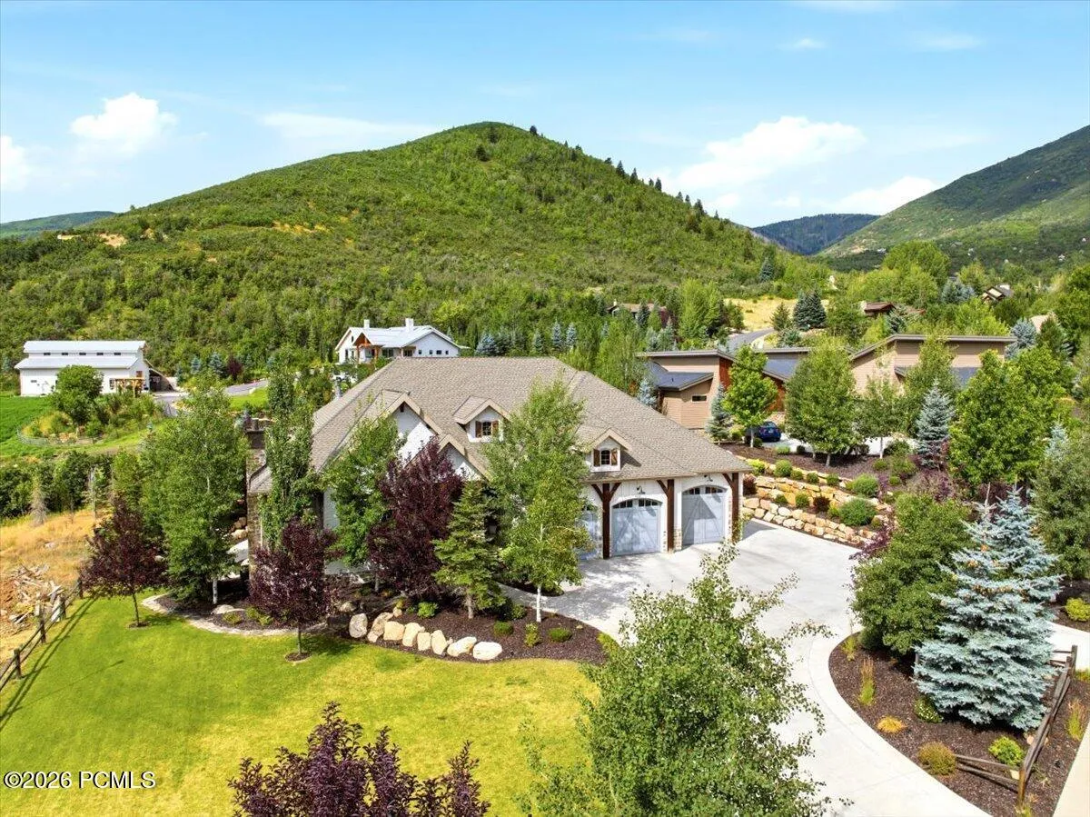 Aerial view of the front of the property featuring views of Lime Canyon