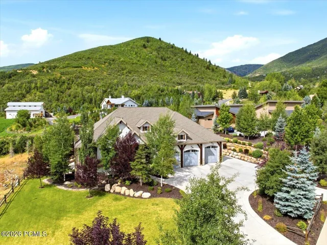 Aerial view of the front of the property featuring views of Lime Canyon