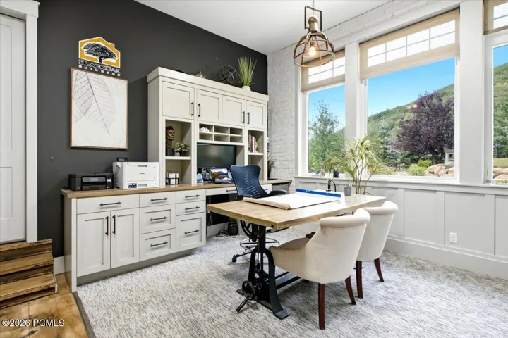 Integrated built-in cabinetry with natural wood-finish countertops